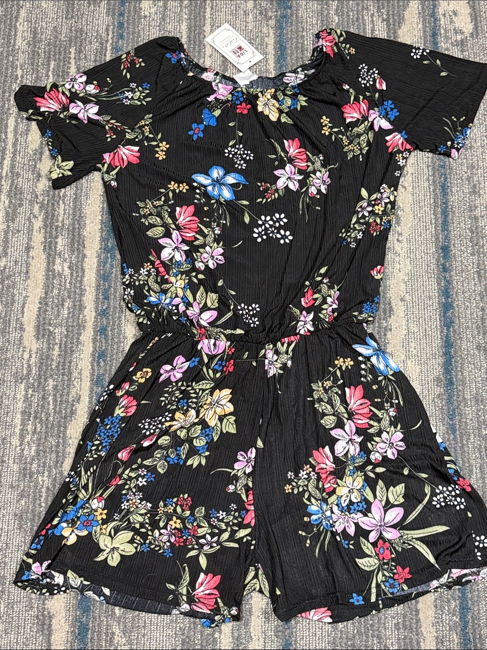 NWT size L / XL Black Floral Short Sleeve Romper with Multicolor Floral Blooms